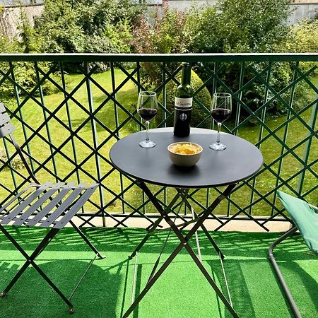Superbe Appartement Avec Belle Vue Jardin ปารีส ภายนอก รูปภาพ