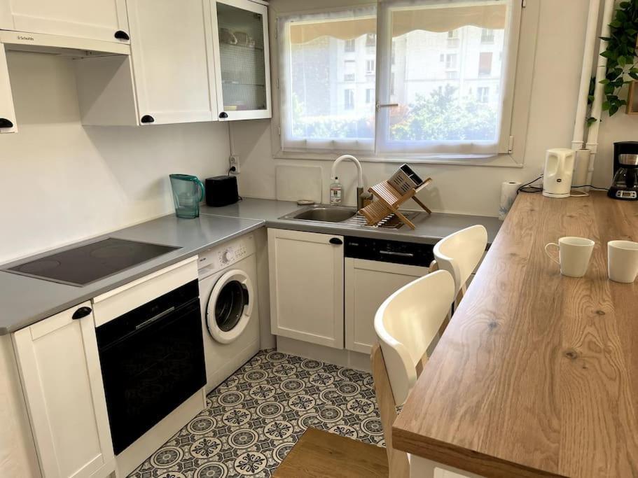 Superbe Appartement Avec Belle Vue Jardin ปารีส ภายนอก รูปภาพ