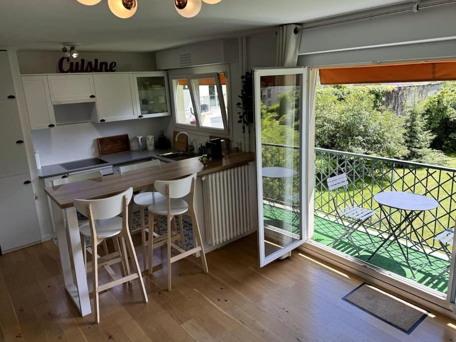 Superbe Appartement Avec Belle Vue Jardin ปารีส ภายนอก รูปภาพ